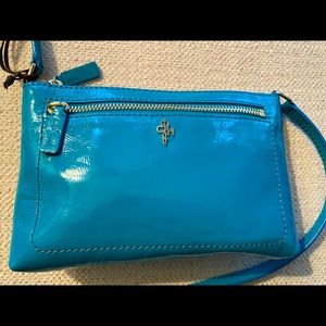 An adorable teal Cole Haan crossbody bag. Used once.  In perfect condition.